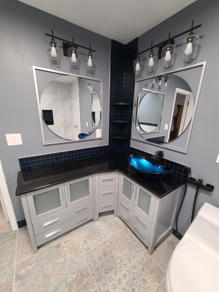 Bathroom corner vanity with round mirrors